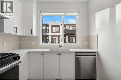 203, 550 Seton Circle Se, Calgary, AB - Indoor Photo Showing Kitchen