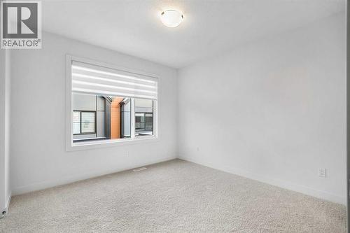 203, 550 Seton Circle Se, Calgary, AB - Indoor Photo Showing Other Room