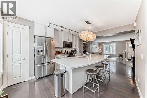 105 Mckenzie Towne Square Se, Calgary, AB - Indoor Photo Showing Kitchen With Stainless Steel Kitchen With Double Sink With Upgraded Kitchen