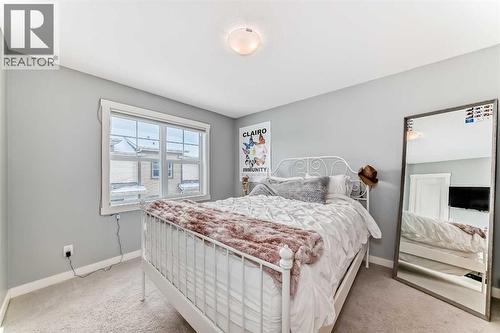 105 Mckenzie Towne Square Se, Calgary, AB - Indoor Photo Showing Bedroom