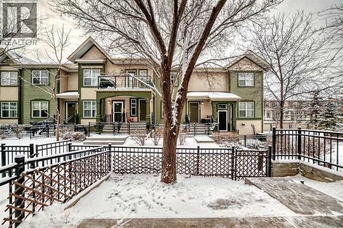 105 Mckenzie Towne Square Se, Calgary, AB - Outdoor With Deck Patio Veranda With Facade
