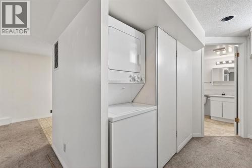 1004 20 Avenue Se, Calgary, AB - Indoor Photo Showing Laundry Room