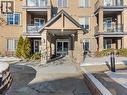 2207, 1888 Signature Park Sw, Calgary, AB  - Outdoor With Balcony With Facade 