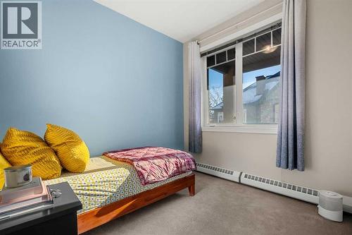 2207, 1888 Signature Park Sw, Calgary, AB - Indoor Photo Showing Bedroom