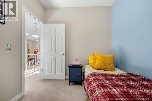 2207, 1888 Signature Park Sw, Calgary, AB - Indoor Photo Showing Bedroom