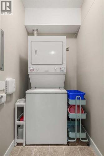2207, 1888 Signature Park Sw, Calgary, AB - Indoor Photo Showing Laundry Room
