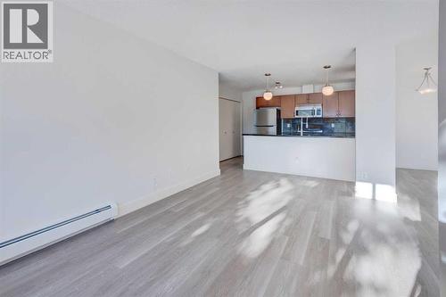 1, 101 Village Heights Sw, Calgary, AB - Indoor Photo Showing Kitchen