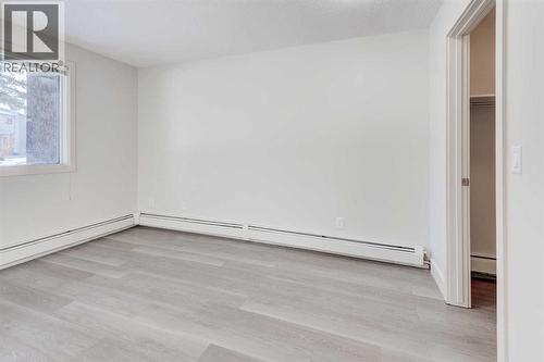 1, 101 Village Heights Sw, Calgary, AB - Indoor Photo Showing Other Room