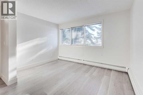 1, 101 Village Heights Sw, Calgary, AB - Indoor Photo Showing Other Room