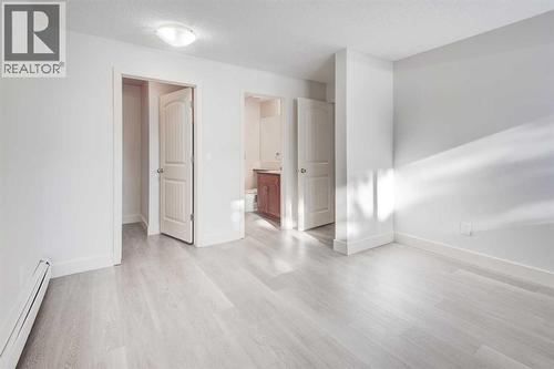 1, 101 Village Heights Sw, Calgary, AB - Indoor Photo Showing Other Room
