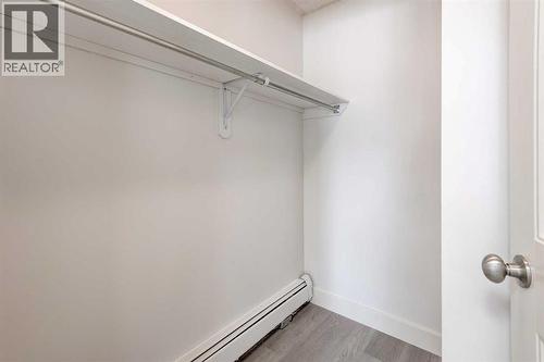 1, 101 Village Heights Sw, Calgary, AB - Indoor With Storage