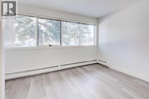 1, 101 Village Heights Sw, Calgary, AB - Indoor Photo Showing Other Room