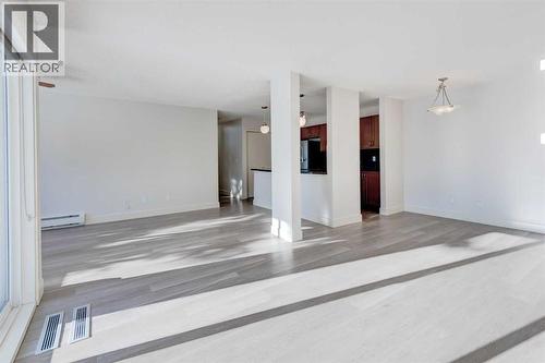 1, 101 Village Heights Sw, Calgary, AB - Indoor Photo Showing Other Room
