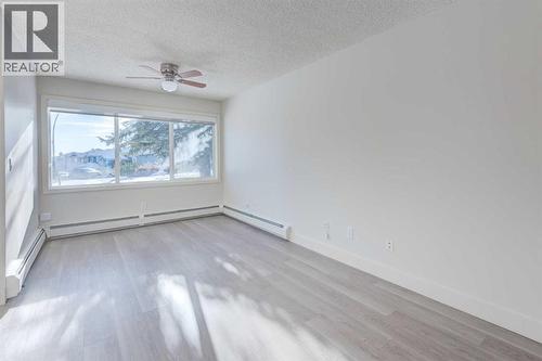 1, 101 Village Heights Sw, Calgary, AB - Indoor Photo Showing Other Room