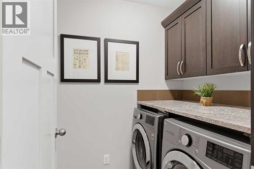 71 Panatella View Nw, Calgary, AB - Indoor Photo Showing Laundry Room