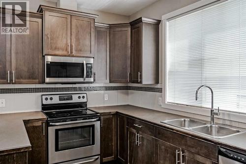 108 Redstone View Ne, Calgary, AB - Indoor Photo Showing Kitchen With Stainless Steel Kitchen With Double Sink