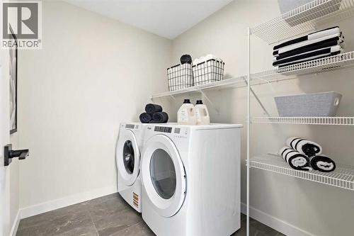 116 Huxland Close Ne, Calgary, AB - Indoor Photo Showing Laundry Room