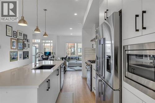 213 Greenbriar Common Nw, Calgary, AB - Indoor Photo Showing Kitchen With Stainless Steel Kitchen With Upgraded Kitchen