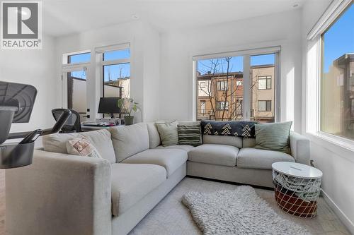 Large Living Room with East Exposures - 213 Greenbriar Common Nw, Calgary, AB - Indoor Photo Showing Living Room