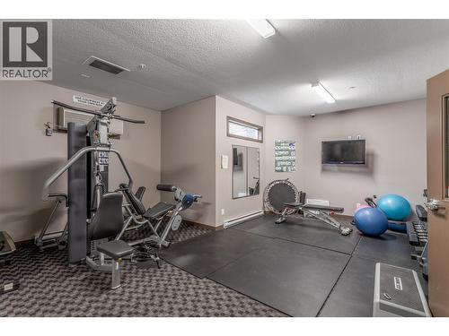 fitness room - 1933 Ambrosi Road Unit# 311, Kelowna, BC - Indoor Photo Showing Gym Room
