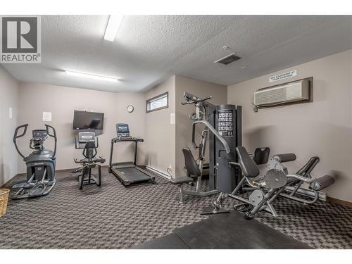 fitness room - 1933 Ambrosi Road Unit# 311, Kelowna, BC - Indoor Photo Showing Gym Room