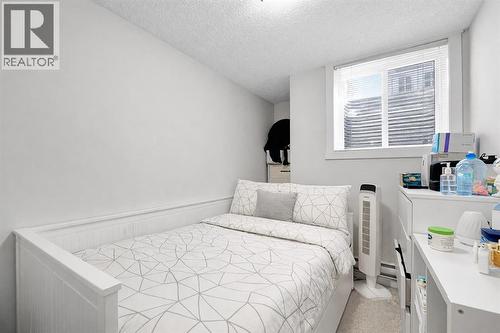317 Cranbrook Square Se, Calgary, AB - Indoor Photo Showing Bedroom