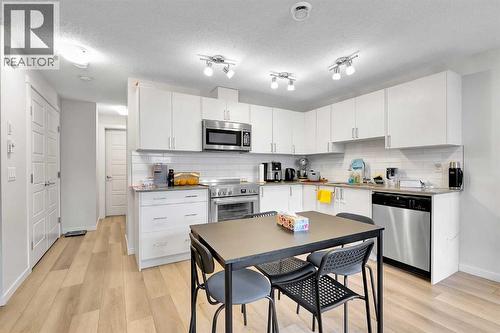 317 Cranbrook Square Se, Calgary, AB - Indoor Photo Showing Kitchen