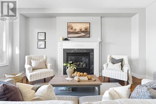 42 Bridle Court, Clarington (Courtice), ON - Indoor Photo Showing Living Room With Fireplace