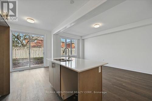 13 - 2184 Postmaster Drive, Oakville, ON - Indoor Photo Showing Kitchen With Double Sink