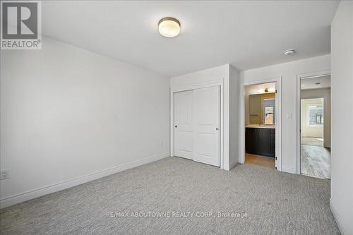 13 - 2184 Postmaster Drive, Oakville, ON - Indoor Photo Showing Other Room