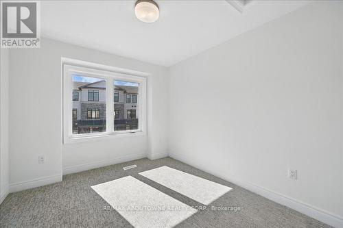 13 - 2184 Postmaster Drive, Oakville, ON - Indoor Photo Showing Other Room