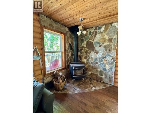 Living area - Lot 4 Pete Martin Bay, Sicamous, BC - Indoor With Fireplace
