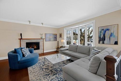 Living room - 3075 Rue Michaud, Brossard, QC - Indoor Photo Showing Living Room With Fireplace