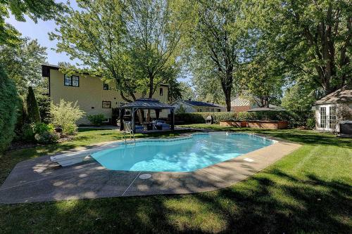 Pool - 1130 Rue Goyer, Saint-Bruno-De-Montarville, QC - Outdoor With In Ground Pool With Backyard