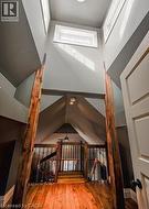 Additional living space with healthy amount of natural light and hardwood / wood-style floors - 