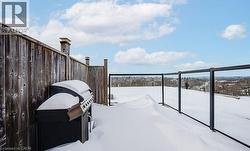 Snow covered patio with grilling area - 
