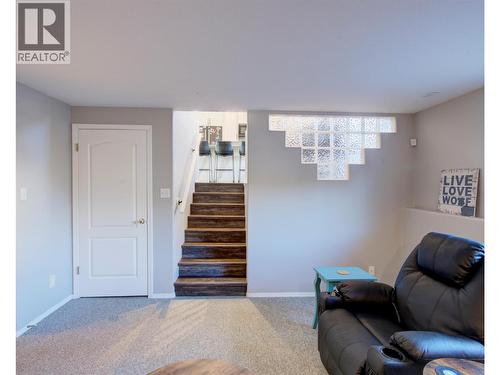 Family room - lower level and stairs to main floor - 2312 Hunter Avenue, Armstrong, BC - Indoor
