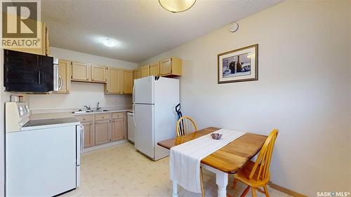 3876 7Th Avenue E, Regina, SK - Indoor Photo Showing Kitchen With Double Sink
