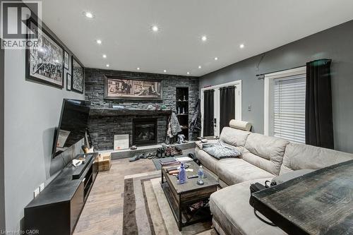 83 Oxford Street, Woodstock, ON - Indoor With Fireplace