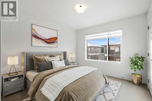 202, 550 Seton Circle Se, Calgary, AB - Indoor Photo Showing Bedroom