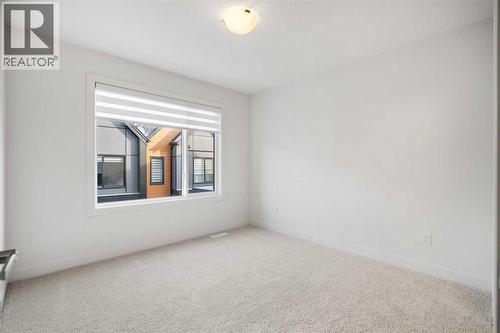 202, 550 Seton Circle Se, Calgary, AB - Indoor Photo Showing Other Room