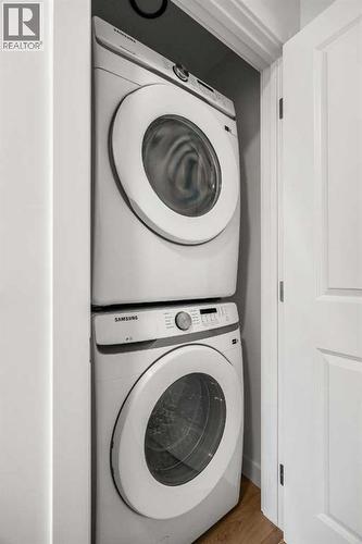 202, 550 Seton Circle Se, Calgary, AB - Indoor Photo Showing Laundry Room