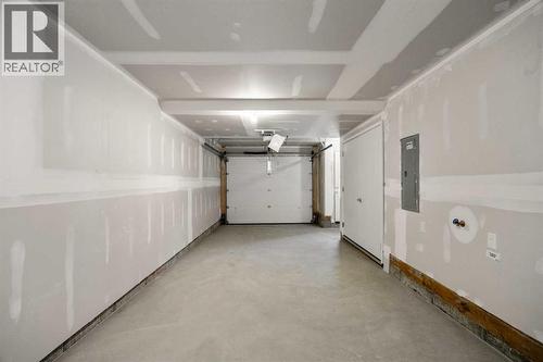 202, 550 Seton Circle Se, Calgary, AB - Indoor Photo Showing Garage