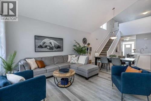 380 Rivercrest View, Cochrane, AB - Indoor Photo Showing Living Room