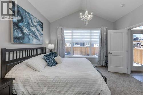 380 Rivercrest View, Cochrane, AB - Indoor Photo Showing Bedroom