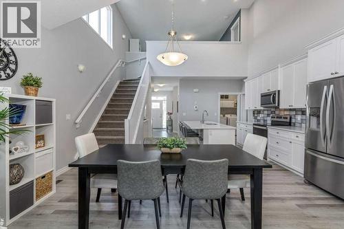 380 Rivercrest View, Cochrane, AB - Indoor Photo Showing Dining Room