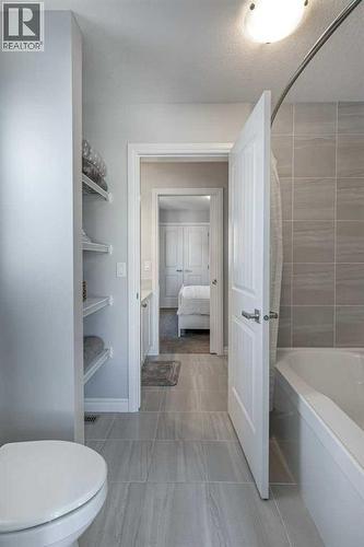 380 Rivercrest View, Cochrane, AB - Indoor Photo Showing Bathroom