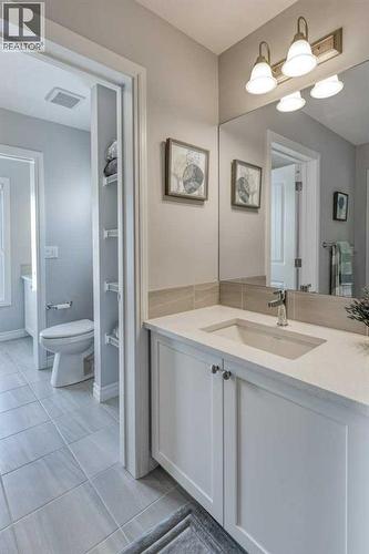380 Rivercrest View, Cochrane, AB - Indoor Photo Showing Bathroom