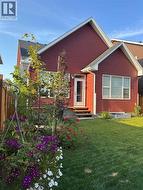 Summer photo supplied by home owner show a gorgeous yard with solid privacy fence - 