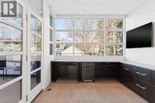 DOUBLE OFFICE WITH ADJUSTIBLE-HEIGHT DESKS, LOCKING FILE DRAWERS AND ADDITIONAL STORAGE FOR PRINTERS ETC - 530 Crescent Road Nw, Calgary, AB - Indoor